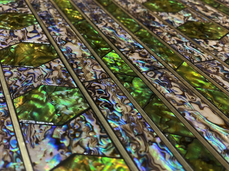 Leafat, luxury decorative tiles for floors, walls and furnishing accessories. Leather or mother-of-pearl mosaics for unique interior designs.